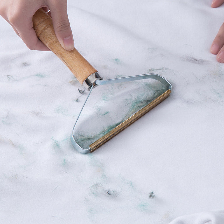 Restore Your Fabrics with the Magic Touch Portable Lint and Pet Hair Remover