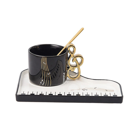 Sip in Musical Style: Golden Accented Piano Cup & Saucer Set