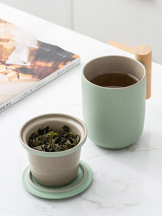 Savor Serenity with Our Ceramic Tea Leaf Strainer Mug: Where Elegance Meets Functionality